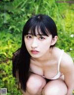 Hinata Matsumoto 松本日向, Ex-Taishu 2021.08 (EX大衆 2021年8月号) A woman in a white bikini sitting on the ground.