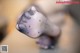 A close up of a person's foot with black dots on it.